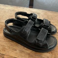 Purchased From Chanel Beverly Hills. Super Rare Style. Black Patent Leather With Cc Logo Stitching. Comes With Dust Bags. Very, Very Good Condition! Size Eu 41. Dad Sandals, Black On Black, Cc Logo, Chanel Shoes, Black Patent Leather, Beverly Hills, Women's Shoes Sandals, Patent Leather, Shoes Sandals