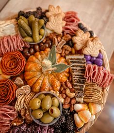 a basket filled with lots of different types of food on top of a wooden table