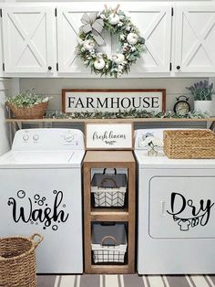 a white washer and dryer sitting next to each other in a laundry room