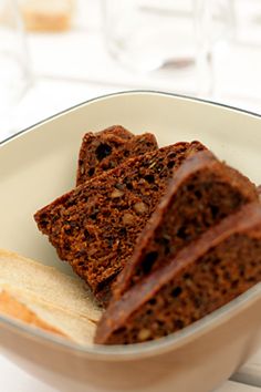 there are three pieces of chocolate cake in the bowl