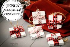 small presents wrapped in red and white paper tied with twine