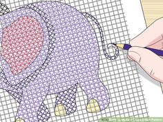 someone is drawing an elephant with colored pencils on the paper and it looks like they are