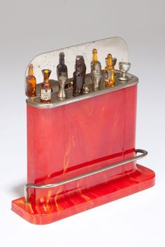 an assortment of bottles in a red case