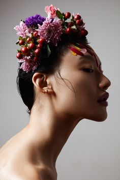 a woman with flowers in her hair