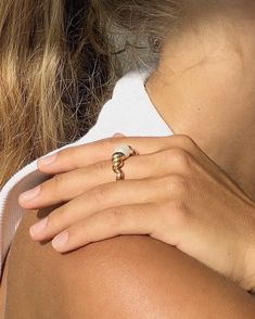 The Pearl Croissant Ring is a unique and stylish piece of jewelry. It features an oval pearl in the center, surrounded by a beautiful rope-like band. The ring is made of 18k gold plated stainless steel, making it waterproof and tarnish free. This statement ring is perfect for wearing alone or with other jewelry. It's sure to make a statement and add a touch of elegance to any outfit. Size : 6,7,8 Material : 18k gold plated sterling silver  Packed in ILLÁRI ring box  Free cleaning cloth  30 day return policy if unworn or not damaged. Rerun Shipping paid by customer Chic Everyday Dome Ring, Trendy Gold Pearl Ring Gift, Chic Gold Dome Ring Open Style, Elegant Gold Plated Dome Promise Ring, Chic Gold Open Dome Ring, Chic Open Ring Wedding Jewelry, Chic Gold-plated Gold Rings, Chic 14k Gold Open Ring Jewelry, Chic Yellow Gold Ring Jewelry