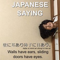 an advertisement for japanese sayings with a woman peeking out from behind the wall and smiling