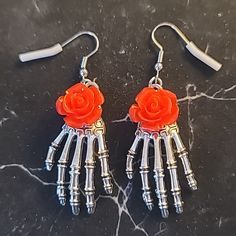 Creepy Hanging Skeleton Hand Earrings With Red Roses Skeleton Hand Earrings, Hanging Skeleton, Creepy Skeleton, Hand Earrings, Skeleton Hand, Skeleton Hands, Earrings Color, Lady In Red, Red Roses