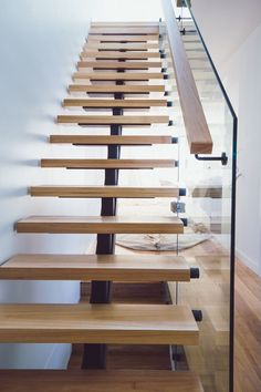 the stairs are made of wood and metal