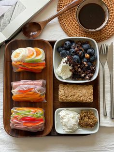 an assortment of food is displayed on a tray