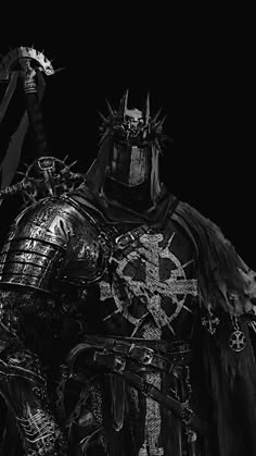 a black and white photo of a knight