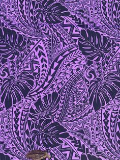 a purple and black wallpaper with an intricate design on it's surface,