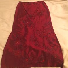 Gorgeous Deep Red Silk Skirt With Beading. Lined On Inside To Above The Knee. French Connection Size 4 Never Worn. Red Silk Skirt For Evening, Red Silk Skirt For Party, Red Silk Party Skirt, Elegant Red Silk Skirt, Elegant Red Holiday Skirt, Embellished Fitted Holiday Skirt, Holiday Embellished Fitted Skirt, Festive Red Fitted Skirt, Red Fitted Skirt For Evening