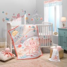 a baby's room is decorated in pastel colors and features an octopus crib