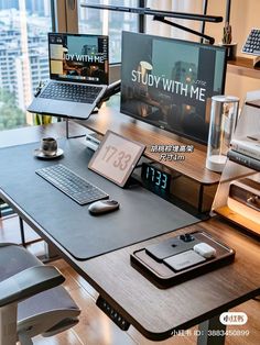 a desk with two laptops and a desktop computer on it