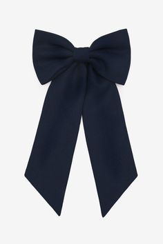 This large, schoolgirl-inspired bow is made of the same poly gabardine that we use to make our beloved tennis skirts. This textile offers a classic look with polished structure. Features a french barrette hair clasp.  Made in Los Angeles, Calif. Our experienced sewers earn up to $25 an hour and no less than $17.25; additionally workers have healthcare benefits for less than $15 per week, a 401k plan, paid sick days, subsidized bus passes and favorable overtime benefits.  • Made in Los Angeles, Calif.  100% Polyester Lace Knitwear, Denim Short Jumpsuit, Hair Clasp, Kids Garments, Women In Black, Wardrobe Solutions, 401k, Tennis Skirts, Long Sleeve Kids