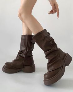 These stylish slouchy leather boots feature a soft, relaxed construction with a comfortable platform sole and buckle strap detailing at the side Material: Vegan Leather Run small, please review the sizing information Brown Slouchy Boots, Foldover Boots, Large Boots, Sketchers Boots, Slouchy Leather Boots, Shoes Grunge, Sand Boots, Grunge Boots, Leather Platform Boots