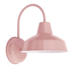 a pink wall light on a white background