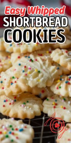 easy whipped shortbread cookies with sprinkles on a cooling rack in the background