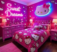 a bedroom decorated in pink with hello kitty bedding