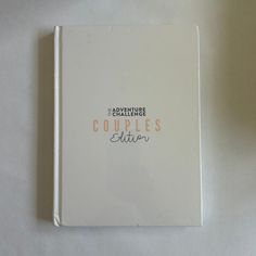 a white book with the words, adventures and couples editor on it's cover