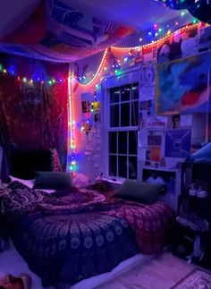 a bedroom decorated with christmas lights and decorations