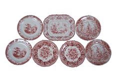 six red and white plates sitting next to each other