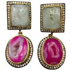 Double Drop druzy earrings features slice geode in pink and white. Embellished with cubic zircon with clutch back closure. Only 1 available. 18K Gold Plated. FOLLOW MEGHNA JEWELS storefront to view the latest collection & exclusive pieces. Meghna Jewels is proudly rated as a Top Seller on 1stDibs with 5 star customer reviews. All items manufactured by us are handmade and can be customized or redesigned. Oprah Magazine, Druzy Earrings, White Earrings, Color Rosa, Only 1, Pink And White, Druzy, Pink White, 18k Gold