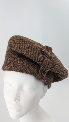 Chic plaid beret made of luxurious English wool.  Keeps you  warm in cozy  shades of brown and burgundy. Fully lined in silk taffeta. Features a self fabric and metal accent. Hand made with care. One of a kind. fits size 22&1/2 to 23rd" head size. Plaid Beret, Winter Hat Women, Couture Hats, Wool Beret, Warm Winter Hats, Wool Berets, Hat Women, Silk Taffeta, Brown Plaid