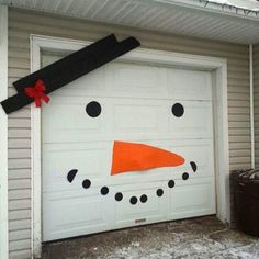 a garage door decorated with a snowman's face