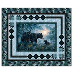 two bears in the woods on a quilted wall hanging or table topper, each with an image of a bear and cub