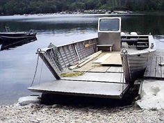 a boat sitting on top of a wooden dock