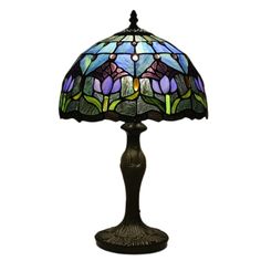 a stained glass lamp on a table