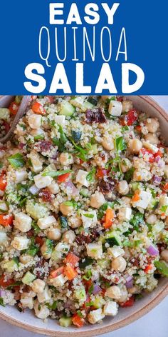 a bowl filled with quinoa salad on top of a blue and white table