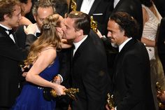 the actors are kissing each other at the oscars