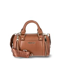 This Madden NYC Women's Multi Zipper Barrel Bag in Cognac is the perfect addition to your Fall wardrobe! This bag is 100% polyurethane and has a zipper closure for the main compartment. The interior features a zipper pocket on the back wall. The exterior has slip pocket on the front wall with a double zippered detail on both sides. There is a also a small zipper pouch that can be removed from the crossbody strap. The crossbody strap has Madden NYC logo embroidered detailing and clips on both sides to be completely removed if you prefer to carry the bag by the double top handles. This is a classic bag that you'll not only want use all Fall, but all year 'round! Size: one size.  Color: Brown.  Gender: female.  Age Group: adult. Nyc Logo, Gothic Boho, Madden Nyc, Small Zipper Pouch, Front Wall, Barrel Bag, Small Pouch, Classic Bags, Small Pouches