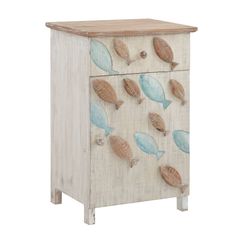 a wooden cabinet with leaves painted on the front and bottom, sitting against a white background