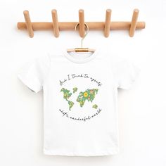 Looking for a cute tee for your kids? We have the perfect What A Wonderful World graphic tee addition to their closet! Also available in youth tees. World Graphic, Trending Graphic Tees, What A Wonderful World, Top Graphic Tees, Wonderful World, Kids Outfits Girls, Toddler Tees, Tee Shop, Fleece Hoodie