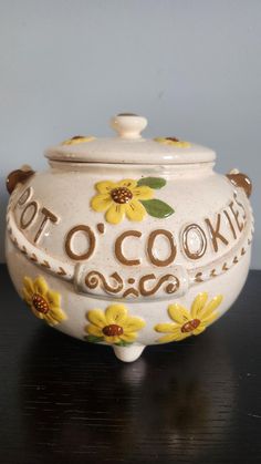 a ceramic cookie jar sitting on top of a table