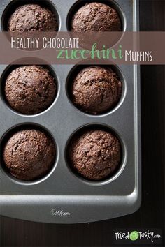 chocolate zucchini muffins in a pan with the words healthy chocolate zucchini muffins