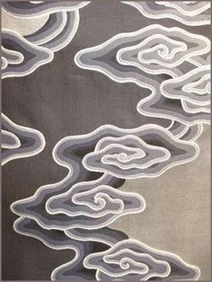 an abstract painting with white and grey colors on a gray background is featured in this image