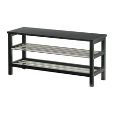 a black wooden shelf with two shelves on each side and one shelf below the shelf