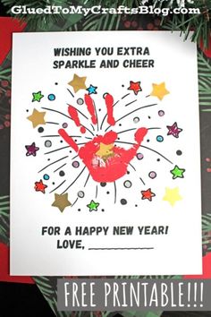 a handprinted card with the words, wishing you extra sparkle and cheer for a happy new year love