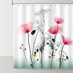 a shower curtain with pink flowers on it