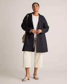 Rain or shine, our Comfort Stretch Trench Coat is your new wardrobe staple. Fashion meets function with the notch lapels, adjustable self-belt, and center-back vent. Plus, the water-resistant finish and lightweight lining make it the perfect transitional layer. It's a timeless piece you'll wear year after year. Prefer a different length? Check out our short and long versions.  | Quince | Women's Comfort Stretch Trench Coat in Midnight Black, Size XS, Organic Cotton Coat Plus Size, Length Check, Long Black Coat, Rain Or Shine, Trench Coats Women, Midnight Black, Christmas 2024, New Wardrobe, Quince