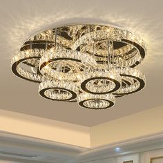 a chandelier hanging from the ceiling in a room