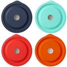 four different colored lids on white background