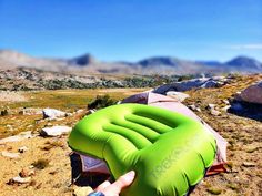 an inflatable mattress sitting on top of a mountain