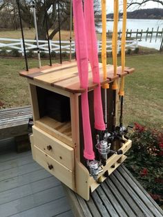 a wooden bench with skis and poles attached to it