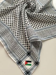 The fabric is of high quality and can be used as a fashion accessory. * The most traditional black and white scarf in Palestine * Palestine flag embroidered on corners Black And White Scarf, White Scarf, Hooded Scarf, Scarf Wrap, Scarf Accessory, Art Collection, Bathing Beauties, Accessory Gift, Display Homes