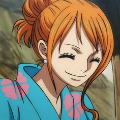 an anime character with red hair wearing a blue kimono and looking at the camera